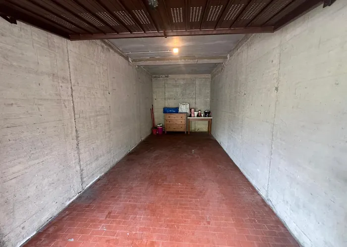 L'acero Rosso - Giardino Privato E Box Auto شقة ميناجيو